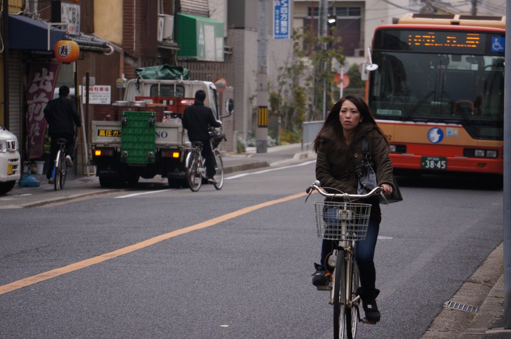 Riding a bike in Japan - a normal, everyday activity.